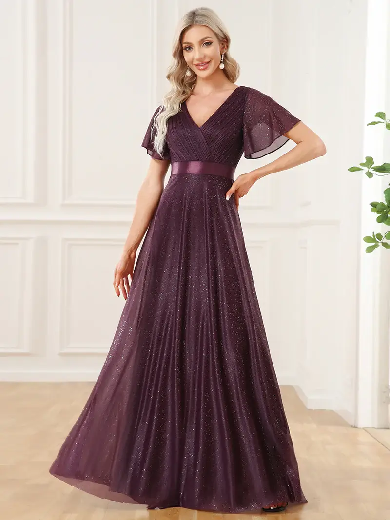 ey50159bo glitter purple plum long evening gown with satin waist and ruffle sleeves eternally yours ey50159bo glitter purple plum long evening gown with satin waist and ruffle sleeves eternally yours
