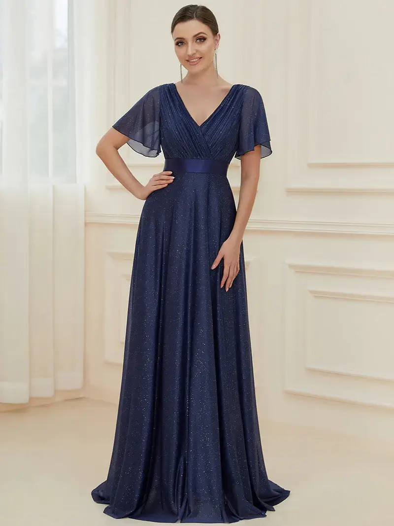 ey50159bo glitter navy blue long evening gown with satin waist and ruffle sleeves eternally yours ey50159bo glitter navy blue long evening gown with satin waist and ruffle sleeves eternally yours