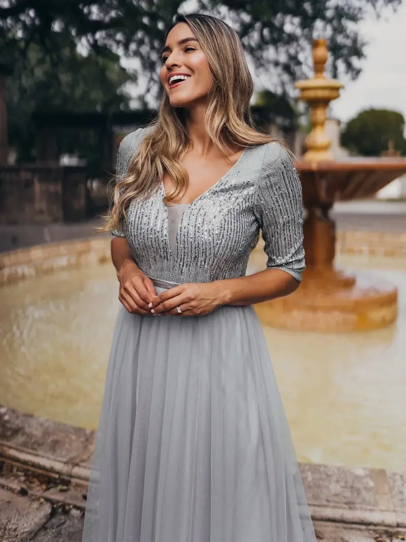 ey0878 grey 1 silver long evening gown with sequins and three quarter sleeves eternally yours ey0878 grey 1 silver long evening gown with sequins and three quarter sleeves eternally yours