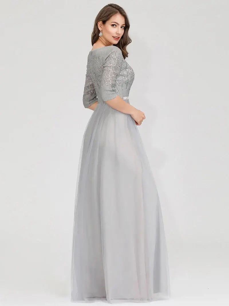 ey0878 grey 2 silver long evening gown with sequins and three quarter sleeves eternally yours ey0878 grey 1 silver long evening gown with sequins and three quarter sleeves eternally yours