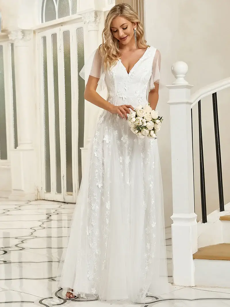 ey0723 1 white A-line wedding gown with lace appliques and tulle sleeves eternally yours